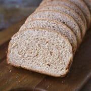 Whole wheat bread sliced on board