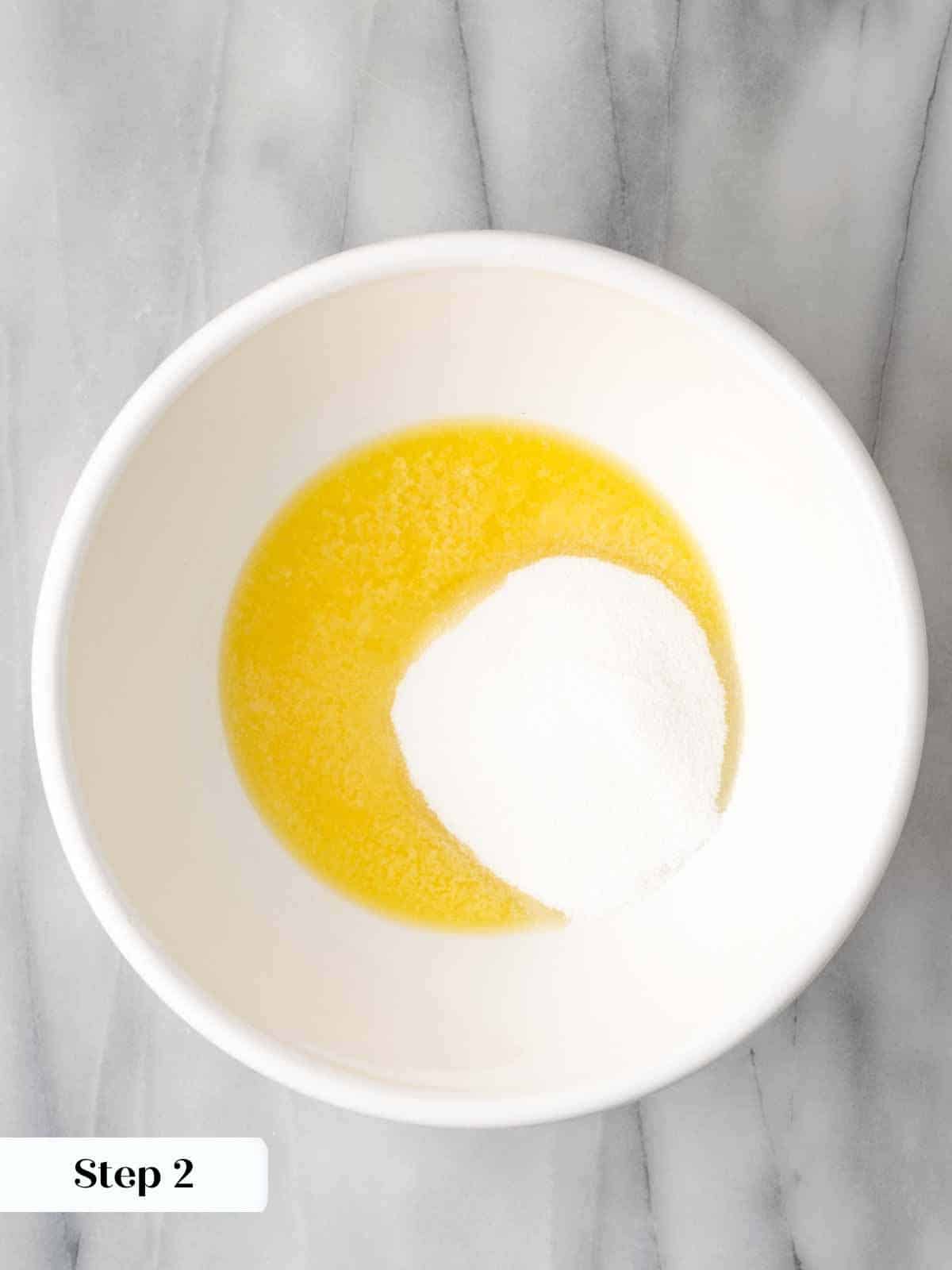 melted butter and sugar in white bowl.