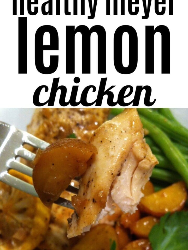 Meyer lemon chicken on a plate with a silver fork.