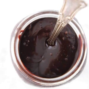 chocolate fudge sauce in jar.