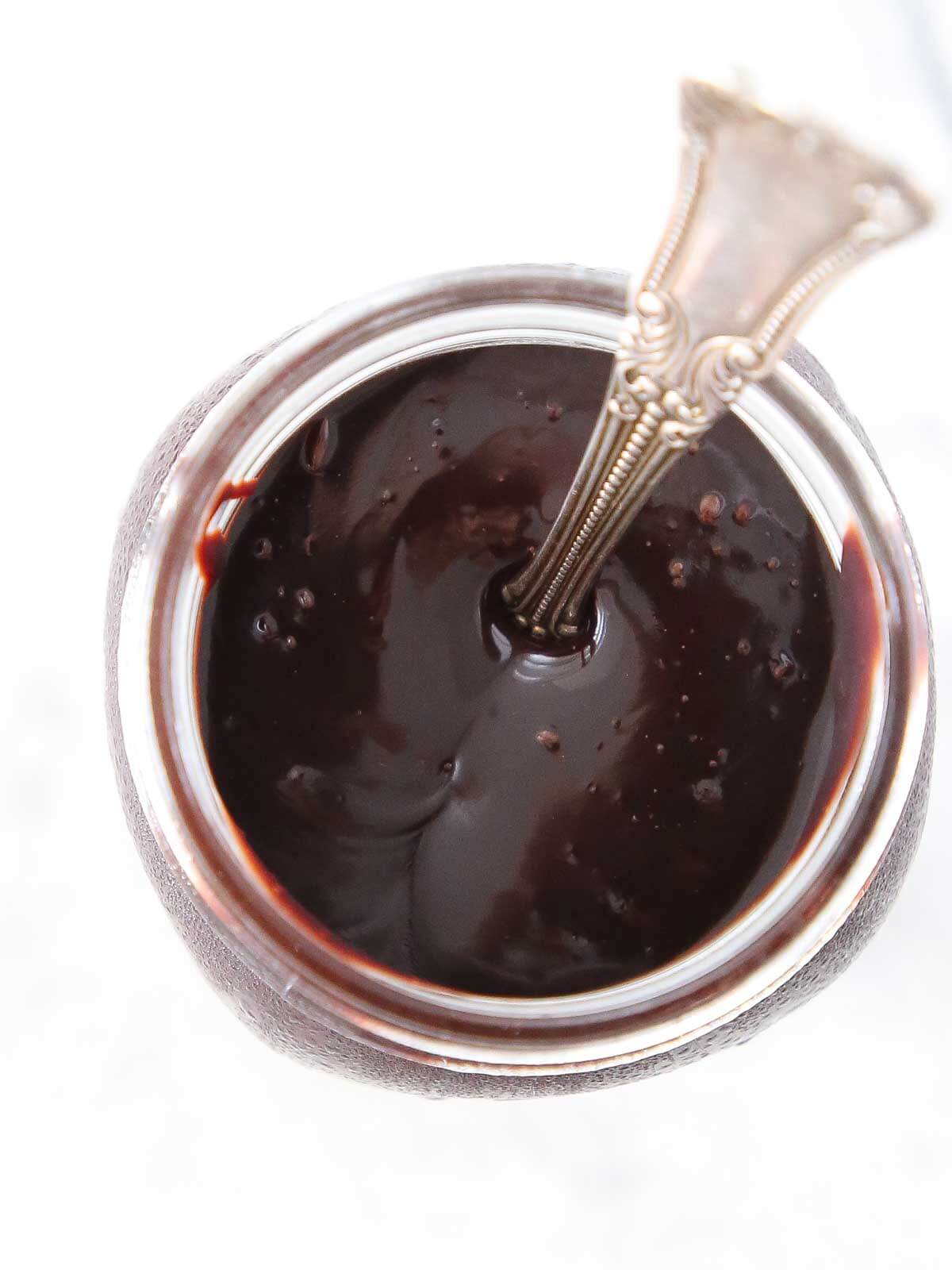 chocolate fudge sauce in jar.