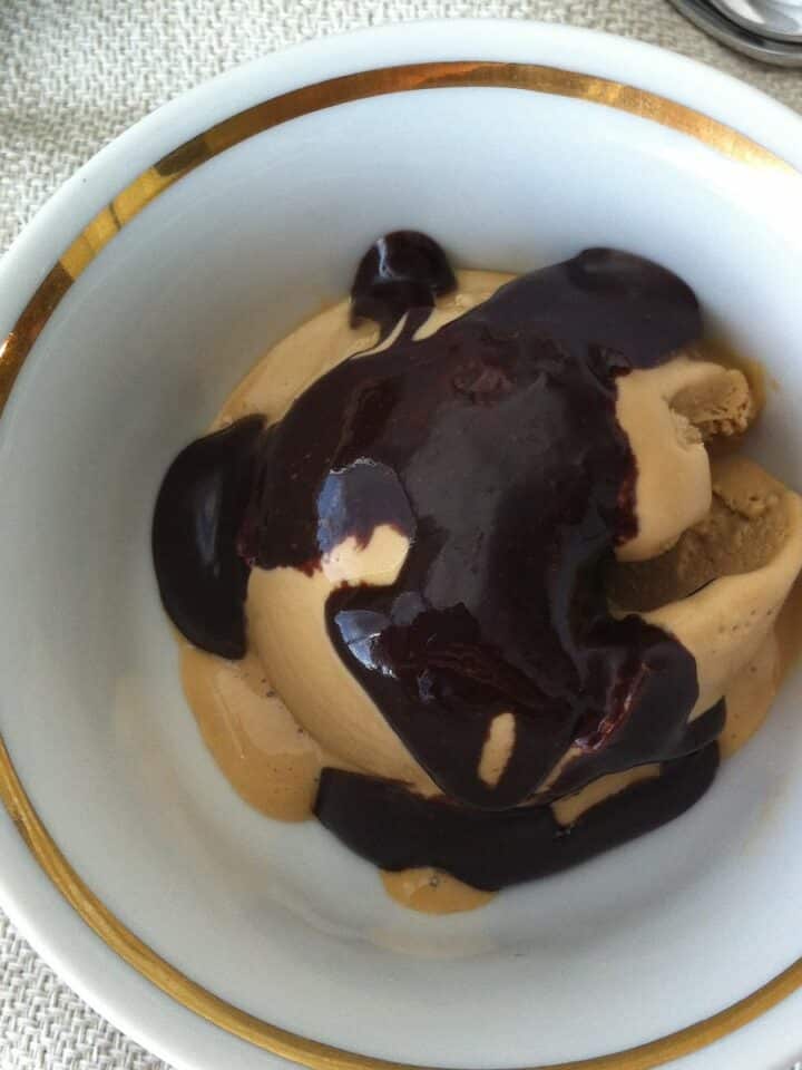 Old Fashioned Hot Fudge Sauce in gold rimmed cup