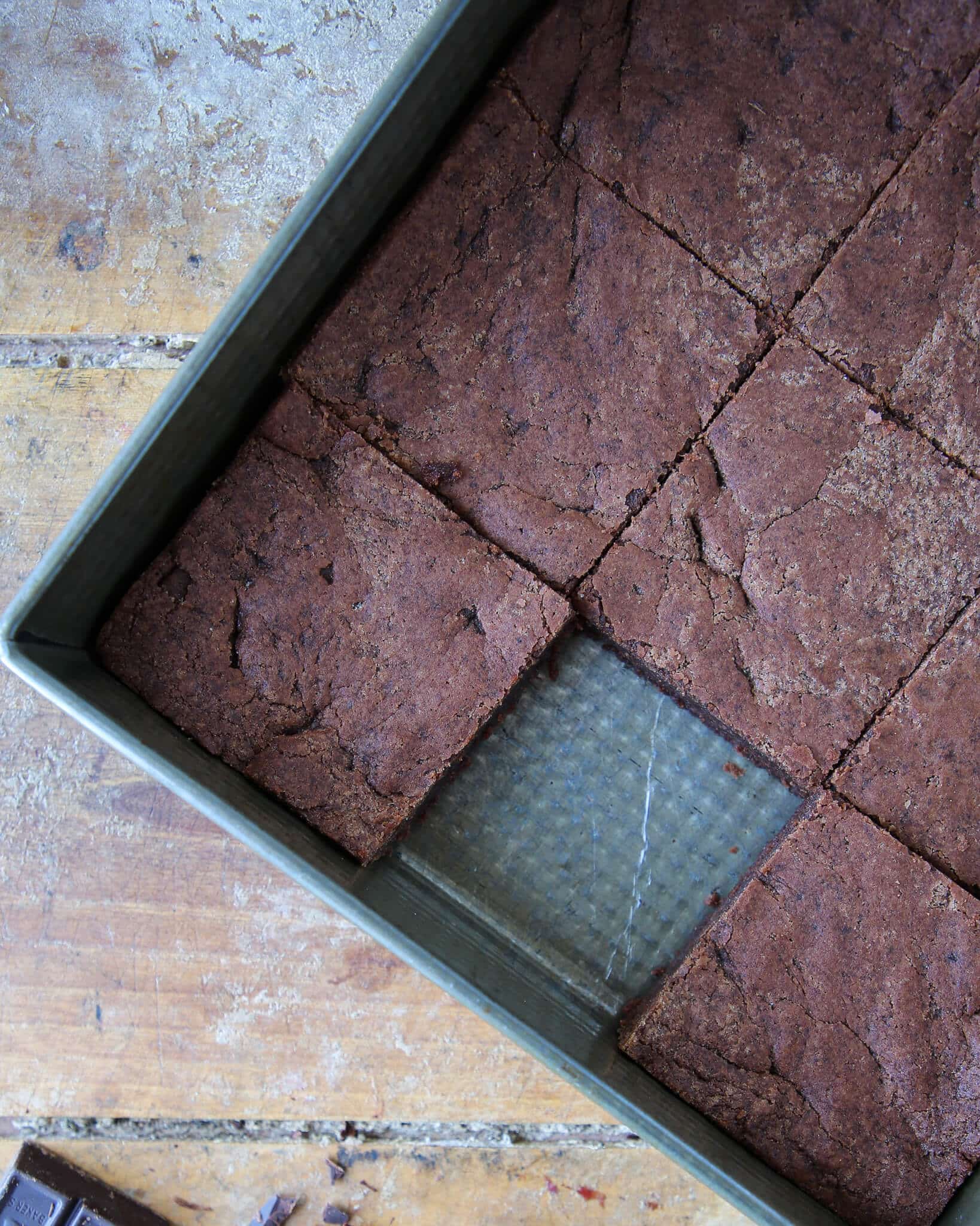 Old Fashioned Fudgy Brownies sliced in baking dish