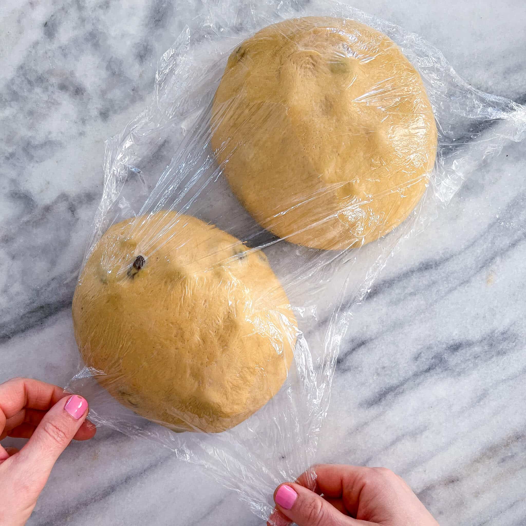 Old Fashioned Raisin Bread Dough shaped on marble