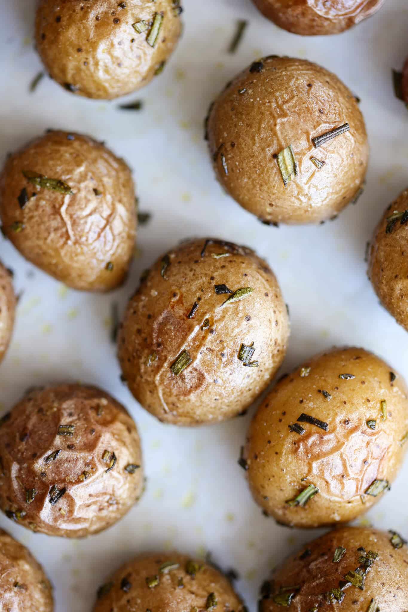 Rosemary Roasted Potatoes close up on baking sheet