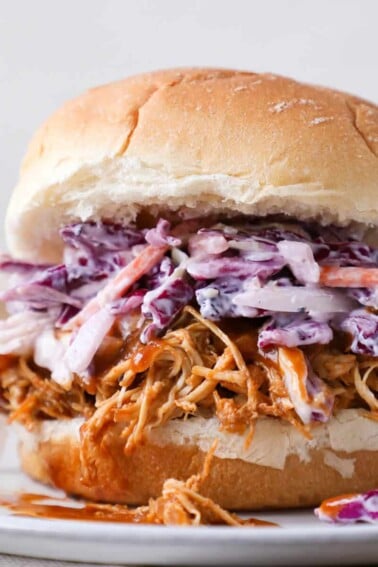 Slow cooker barbecue pulled chicken sandwich with cole slaw