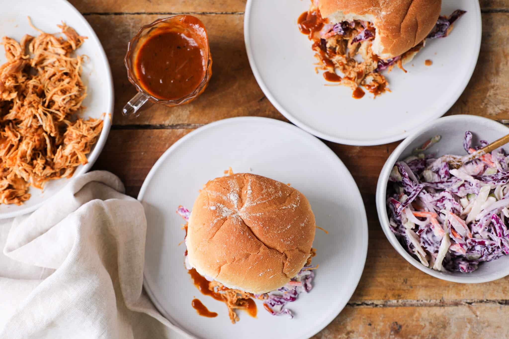 Slow cooker barbecue pulled chicken sandwich tablescape