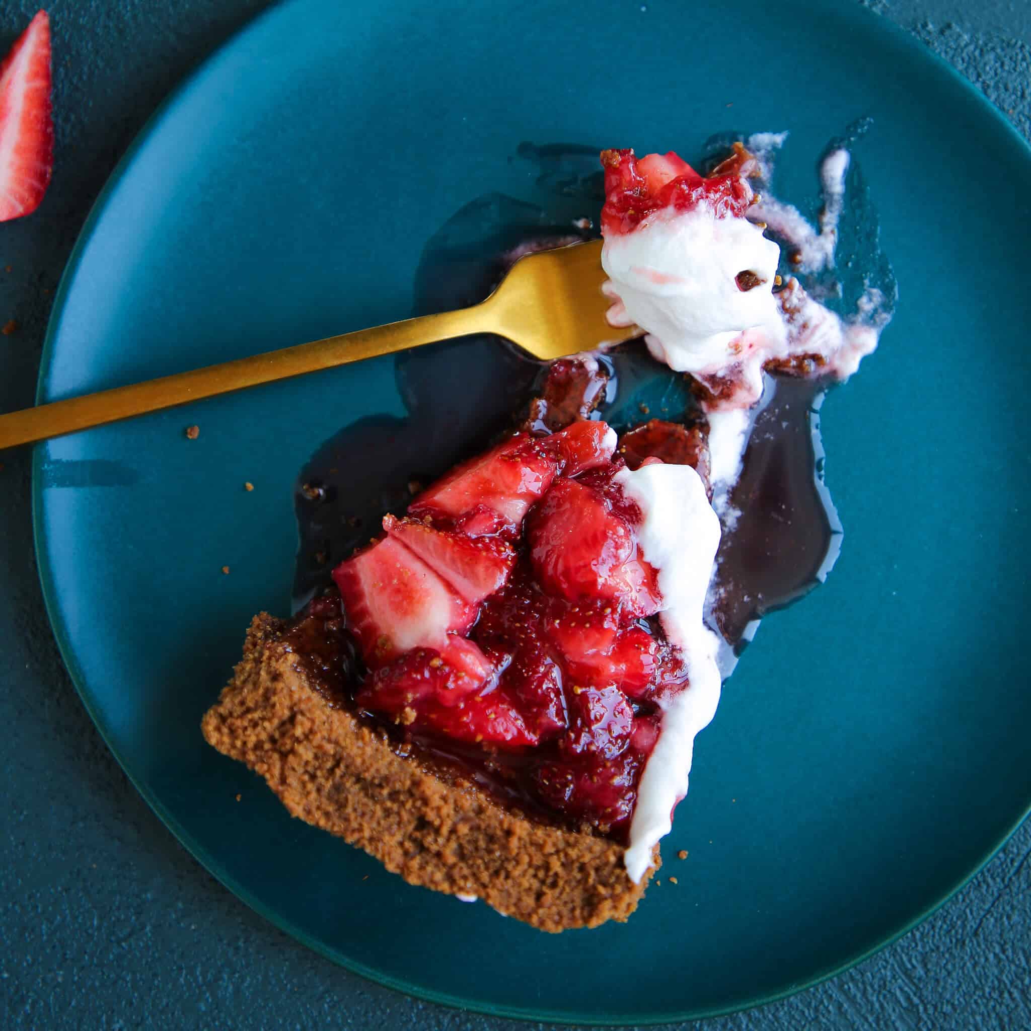 Strawberry Triumph Pie slice with gold fork