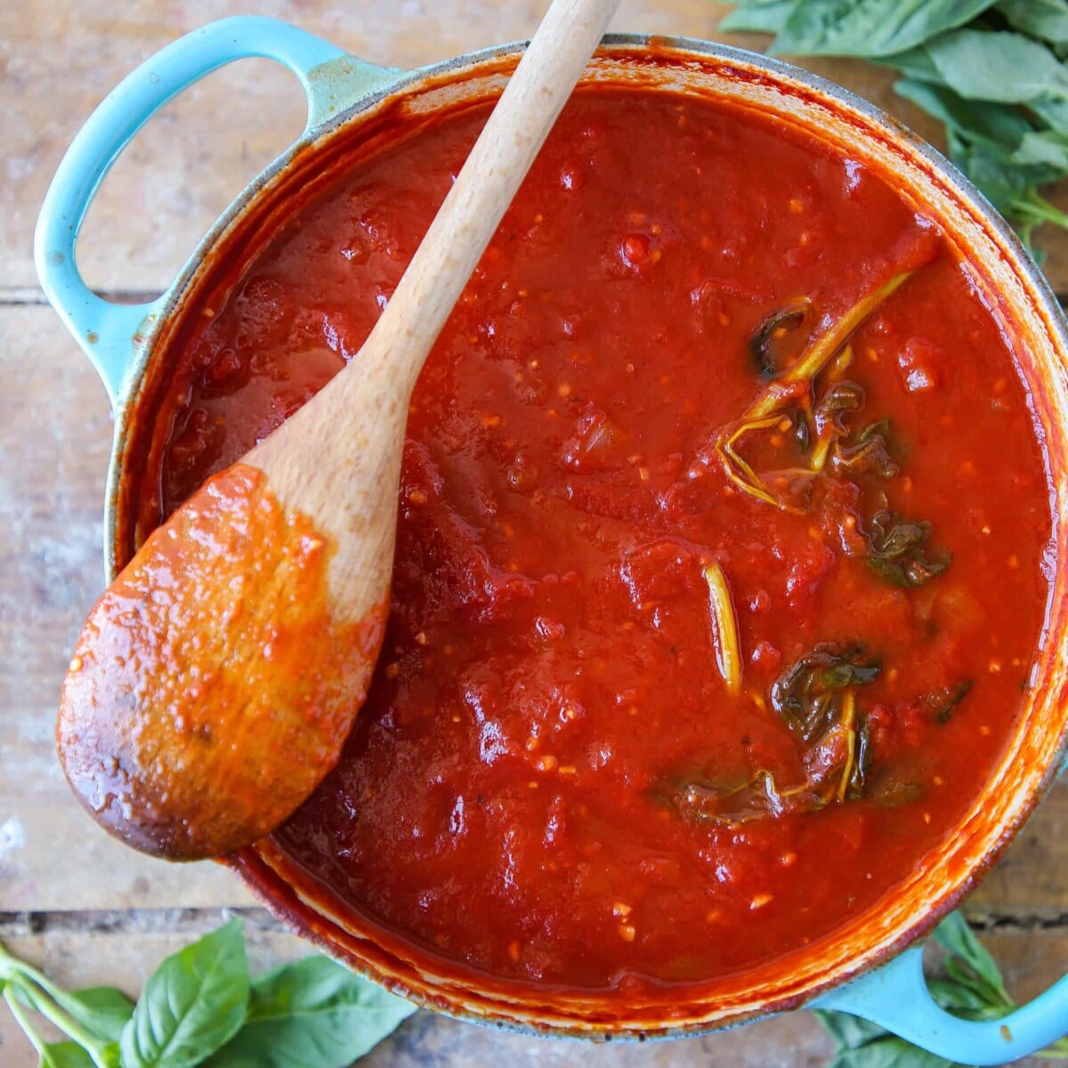 Homemade Tomato Pasta Sauce in blue dutch oven.
