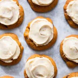 chewy chocolate chip pumpkin cookies with browned butter icing featured