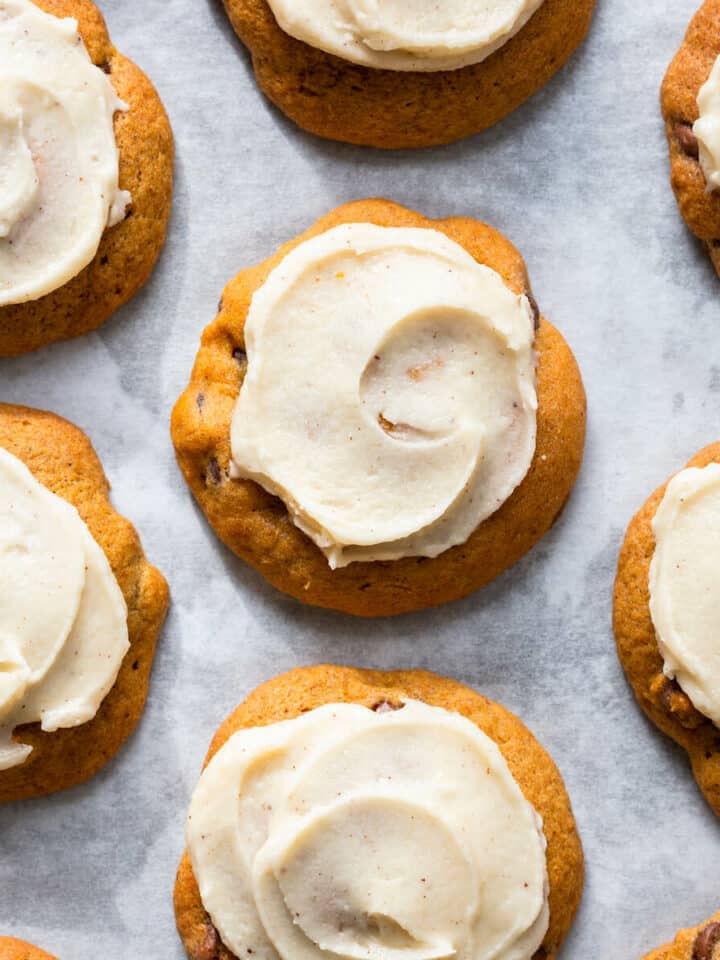 chewy chocolate chip pumpkin cookies with browned butter icing featured