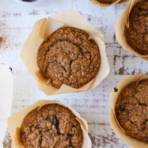 Pumpkin Spice Bran Muffins arranged on board