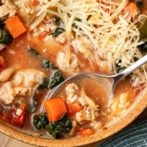 turkey soup on spoon with cheese.