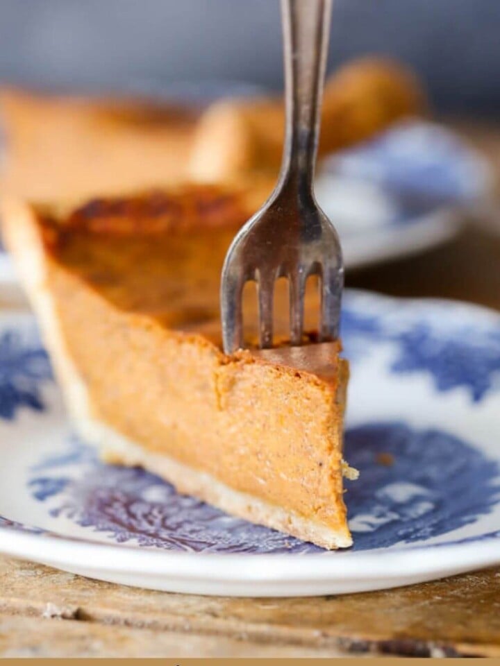 spice of pumpkin pie on vintage blue plate and fork.