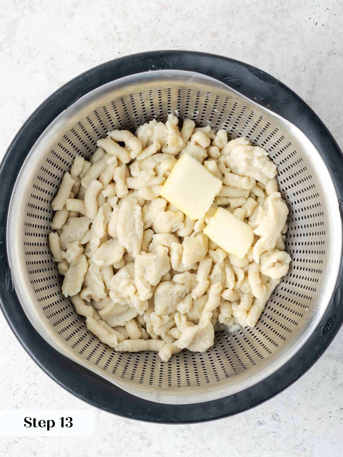 spaetzle in colander with butter.