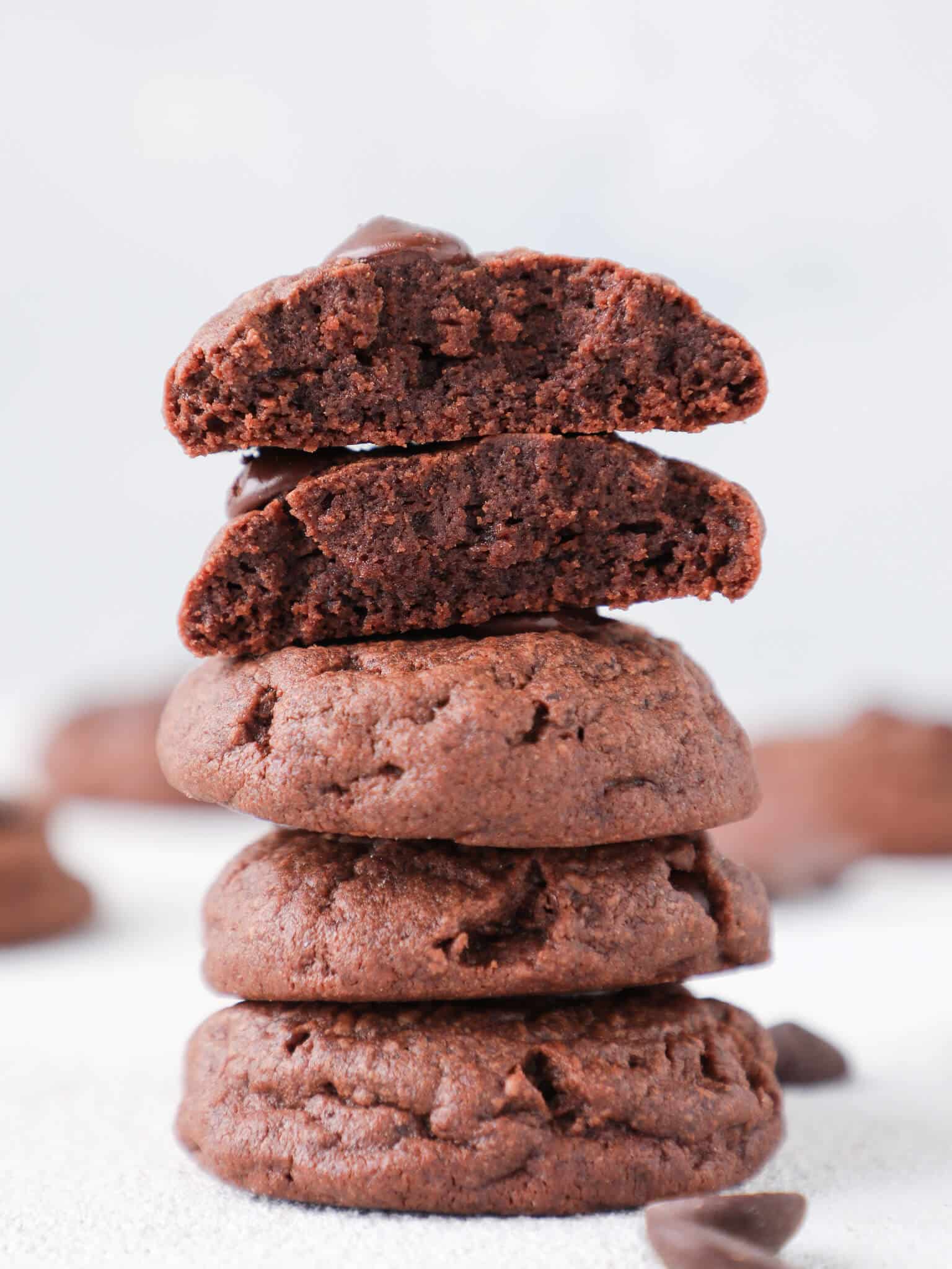 Quadruple Chocolate Pudding Cookies tall stack white background