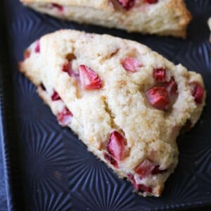 Strawberry Lemon Scones single scone on baking sheet