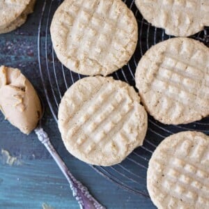 Old Fashioned Peanut Butter Cookies on cooling rack with perfect fork tine impressions.