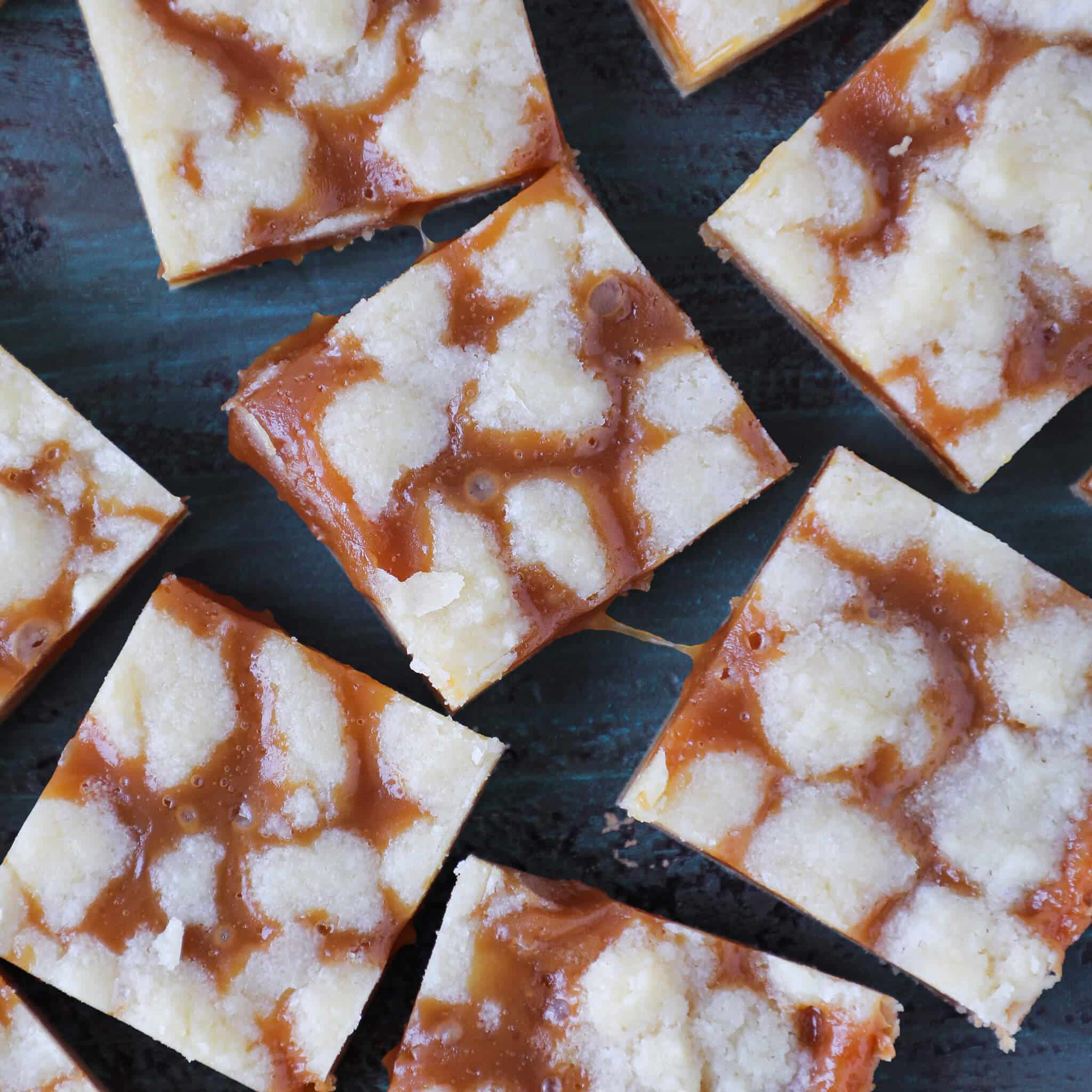 Caramel Butter Bars cut with caramel pull