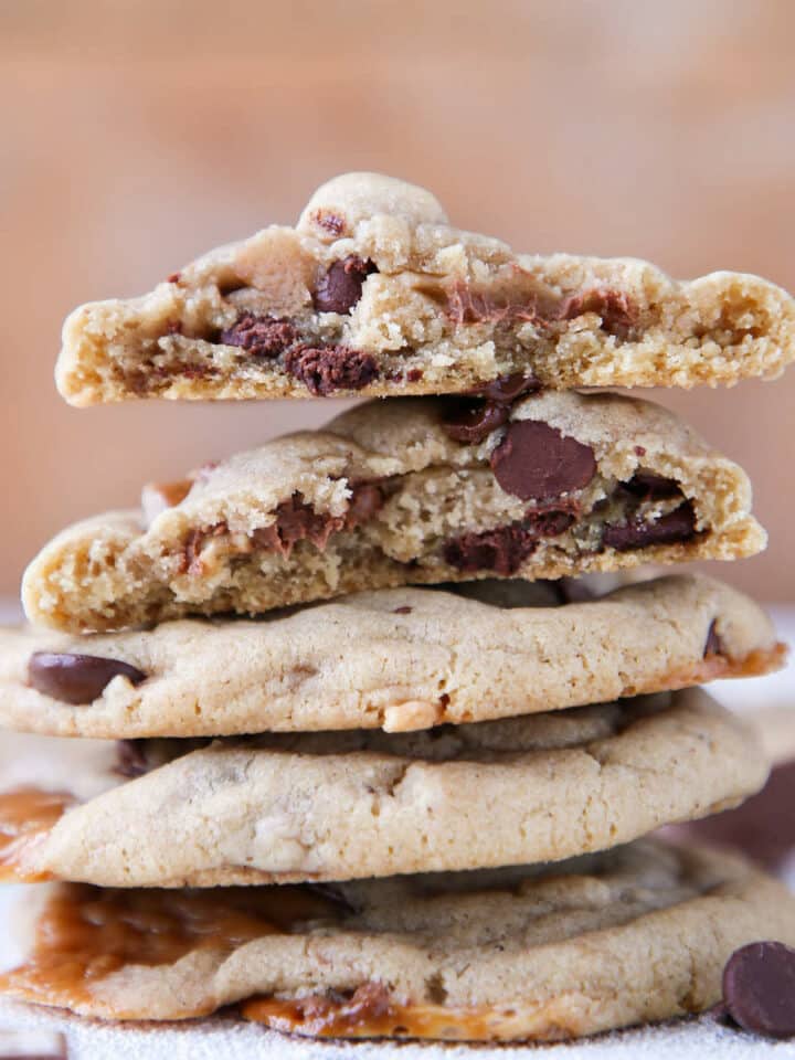 Caramel Stuffed Brown Butter Snickers Chocolate Chip Cookies stacked interior detail