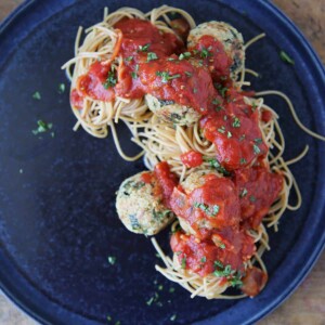 Quinoa Vegetarian Meatballs in sauce on pasta