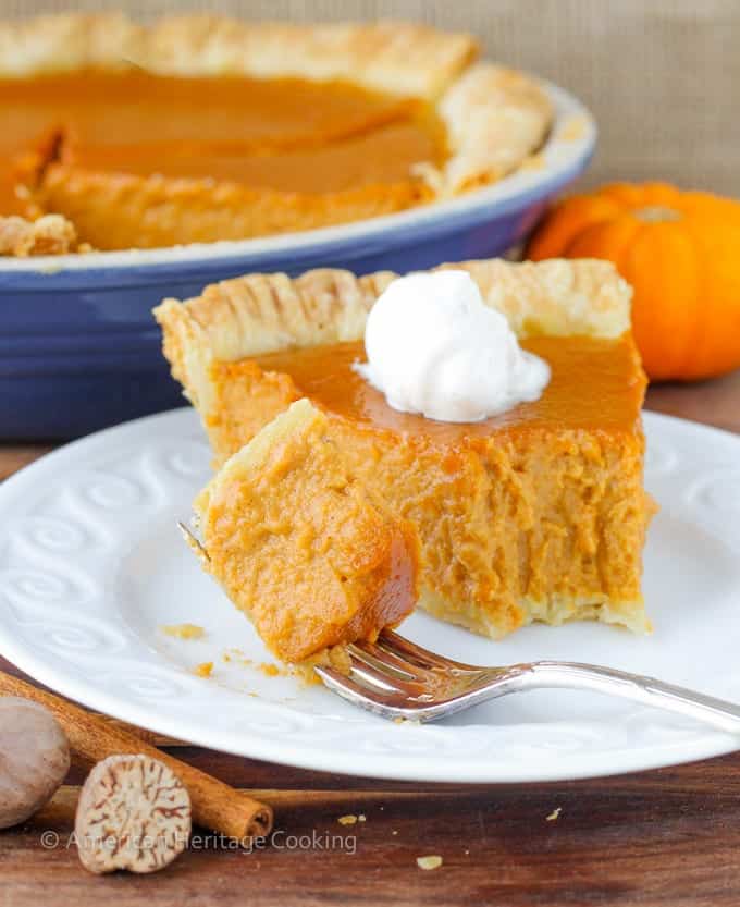 Classic Pumpkin Pie with a Twist | My new favorite pumpkin recipe has lemon zest, spices, vanilla and brown sugar! So amazing! 