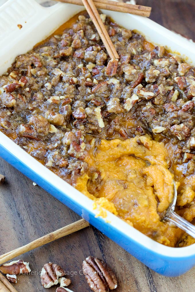 An easy recipe for Sweet Potato Casserole Lightened Up! Still packed with brown sugar, buttery goodness but with half the calories! 