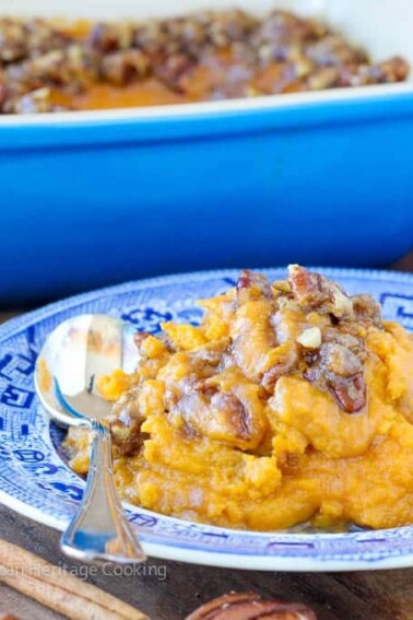 An easy recipe for Sweet Potato Casserole Lightened Up! Still packed with brown sugar, buttery goodness but with half the calories!