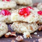 These easy Cherry Pecan Cookies are soft, chewy and nutty. A cream cheese sugar cookie is generously flavored with almond extract and rolled in pecans! My favorite Christmas Cookie recipe of all time!