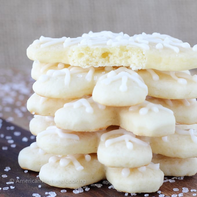 soft sugar cookies shaped like snowflakes stacked.