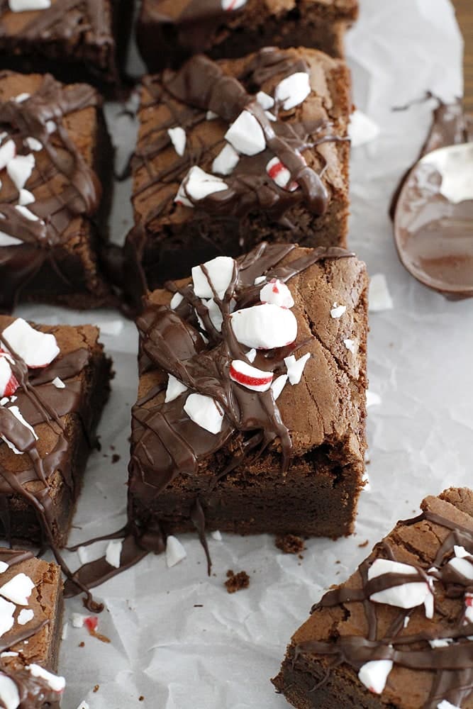 sliced peppermint brownies on parchment.