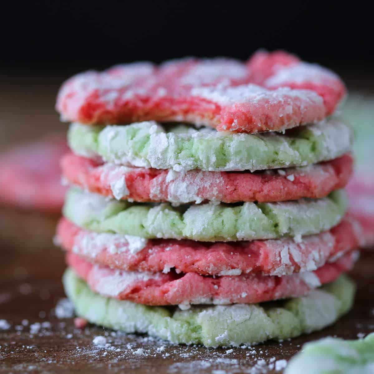 Festive Almond Crinkle Cookies stacked interior texture.