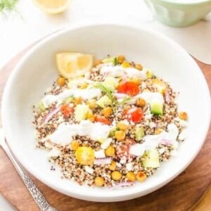Roasted Chickpea Quinoa Greek Salad wooden place setting