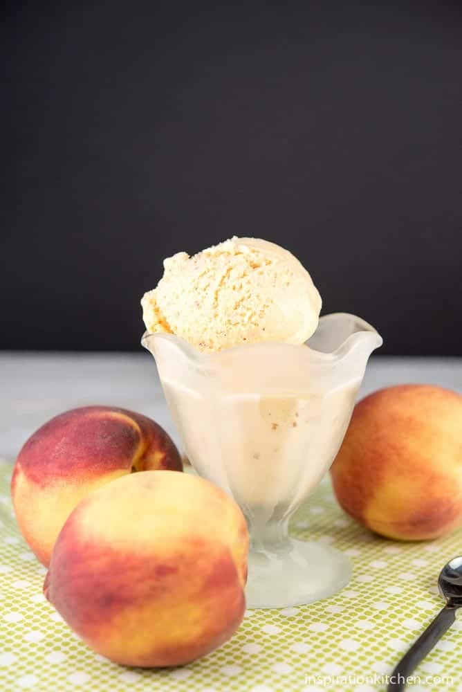 You will love this Fresh Peach Ice Cream | It's like taking a bite of the creamiest, frozen, ripest peach you can imagine wrapped in a sweet dessert!