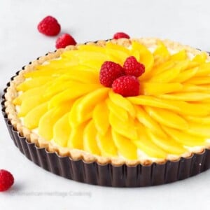 Coconut Mango Tart with sliced mango topping