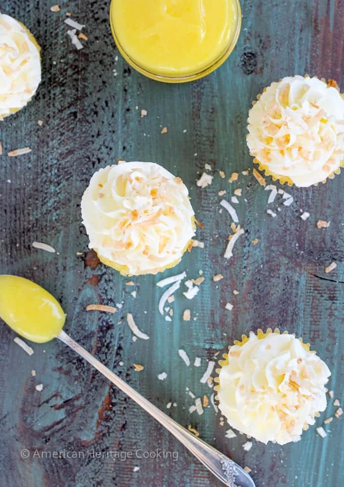 These Lemon Coconut Cupcakes have a moist coconut cake, a sweet, tart lemon curd filling and are topped with a lemon Italian meringue buttercream! 