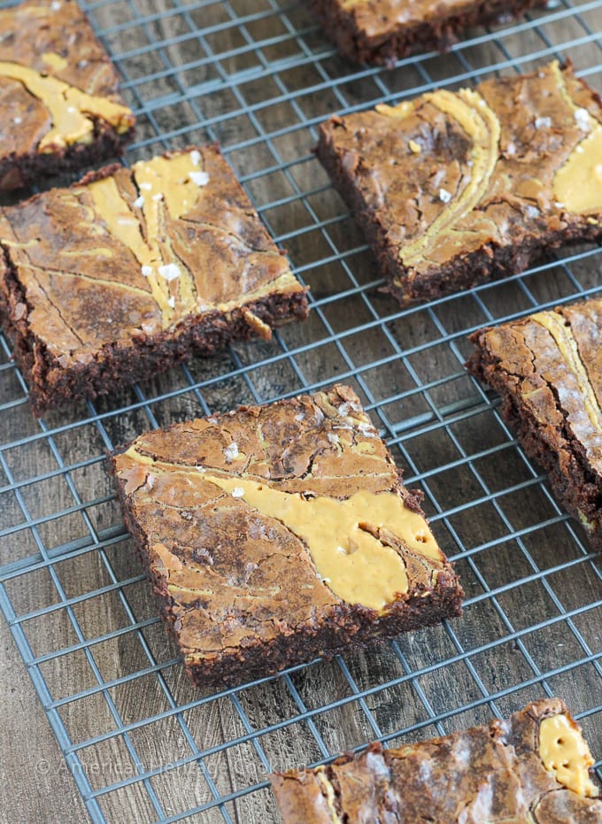These Triple Chocolate Peanut Butter Banana Brownies are rich and chewy! The perfect combination of flavors! Plus a new way to use up those over-ripe bananas on your counter!  