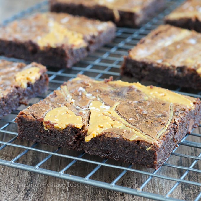 These Triple Chocolate Peanut Butter Banana Brownies are rich and chewy! The perfect combination of flavors! Plus a new way to use up those over-ripe bananas on your counter!  