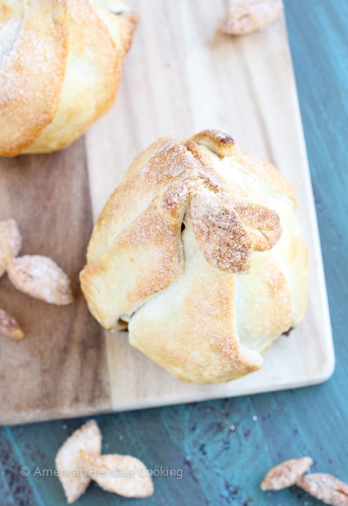 These Brown Sugar Pecan Stuffed Pears are d’Anjou pears stuffed with a simple mixture of brown sugar, cinnamon, cardamom and toasted pecans are wrapped in a flakey pastry, sprinkled with more sugar and topped with a warm butterscotch sauce. 