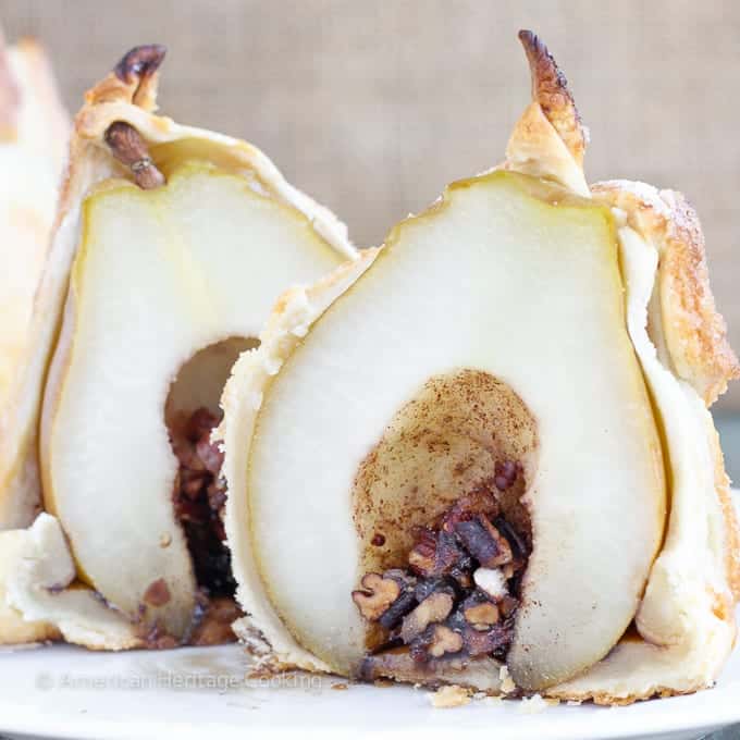 These Brown Sugar Pecan Stuffed Pears are d’Anjou pears stuffed with a simple mixture of brown sugar, cinnamon, cardamom and toasted pecans are wrapped in a flakey pastry, sprinkled with more sugar and topped with a warm butterscotch sauce. 