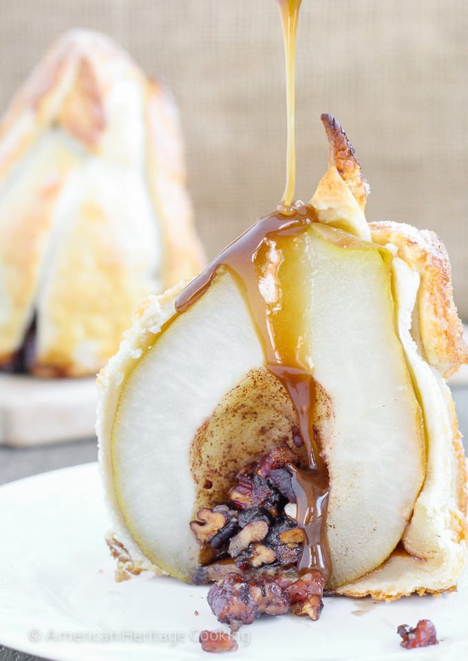 These Brown Sugar Pecan Stuffed Pears are d’Anjou pears stuffed with a simple mixture of brown sugar, cinnamon, cardamom and toasted pecans are wrapped in a flakey pastry, sprinkled with more sugar and topped with a warm butterscotch sauce.