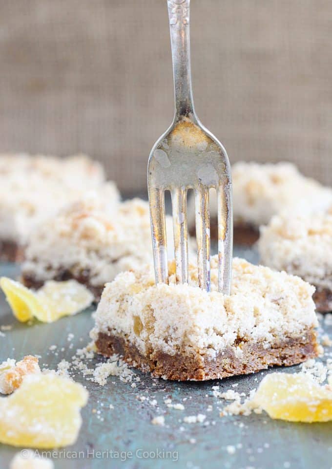 These Chewy Ginger Bars have a gingerbread base with a sweet candied ginger crumble topping!! There is candied ginger folded into the base for a perfect burst of ginger!