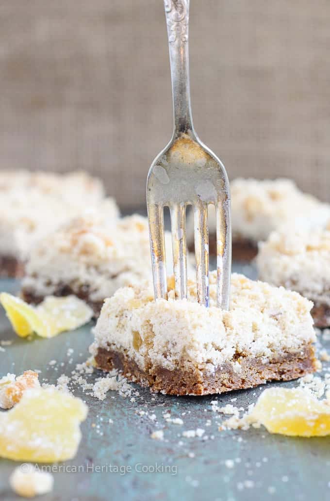These Chewy Ginger Bars have a gingerbread base with a sweet candied ginger crumble topping!! There is candied ginger folded into the base for a perfect burst of ginger! 