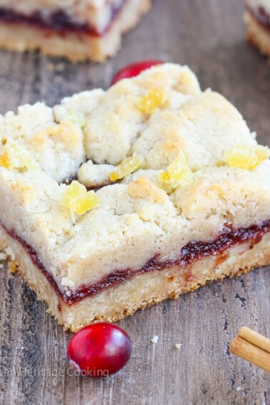 There are few homemade desserts easier than jam bars and these Cranberry Cinnamon Jam Bars are not only easy they pack serious holiday flavor! The cinnamon streusel doubles as both the top and bottom crusts with a gooey, spiced cranberry filling in between.