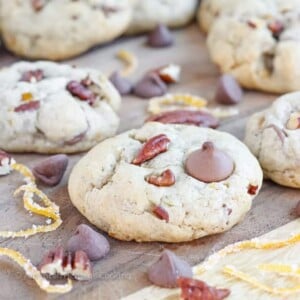 Soft, chewy cinnamon milk chocolate chip cookies with toasted pecans and candied orange peel. These Orange Pecan Milk Chocolate Chip cookies will have you reaching for another before you realize what you’re doing!