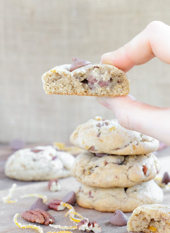 Soft, chewy cinnamon milk chocolate chip cookies with toasted pecans and candied orange peel. These Orange Pecan Milk Chocolate Chip cookies will have you reaching for another before you realize what you’re doing!