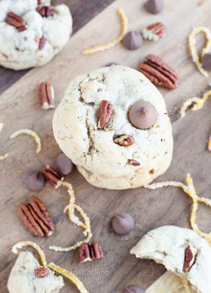 Soft, chewy cinnamon milk chocolate chip cookies with toasted pecans and candied orange peel. These Orange Pecan Milk Chocolate Chip cookies will have you reaching for another before you realize what you’re doing!