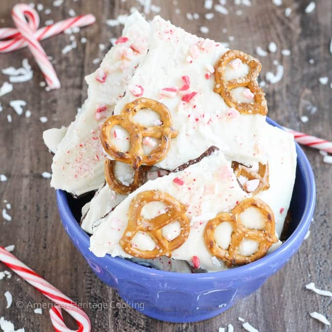 This easy Coconut Peppermint Pretzel Bark is a minty mix of white and dark chocolate with candy cane "snow", salty pretzels and a hint of coconut! You will love the holiday mint flavor!