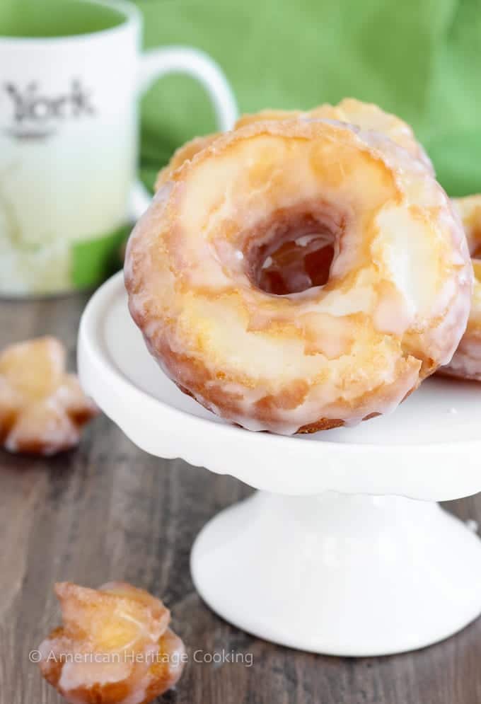 These Old Fashioned Sour Cream Cake Donuts are UNREAL. Unreal. The inside is soft, tender and cakey; and the outside is crispy with a classic sweet glaze. Just like you get at the donut shop!
