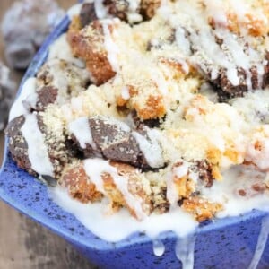 This Coffee Donut Bread Pudding takes everything you love about breakfast and bakes it into one easy dish! Cake donuts baked in a coffee custard for the perfect addition to brunch!